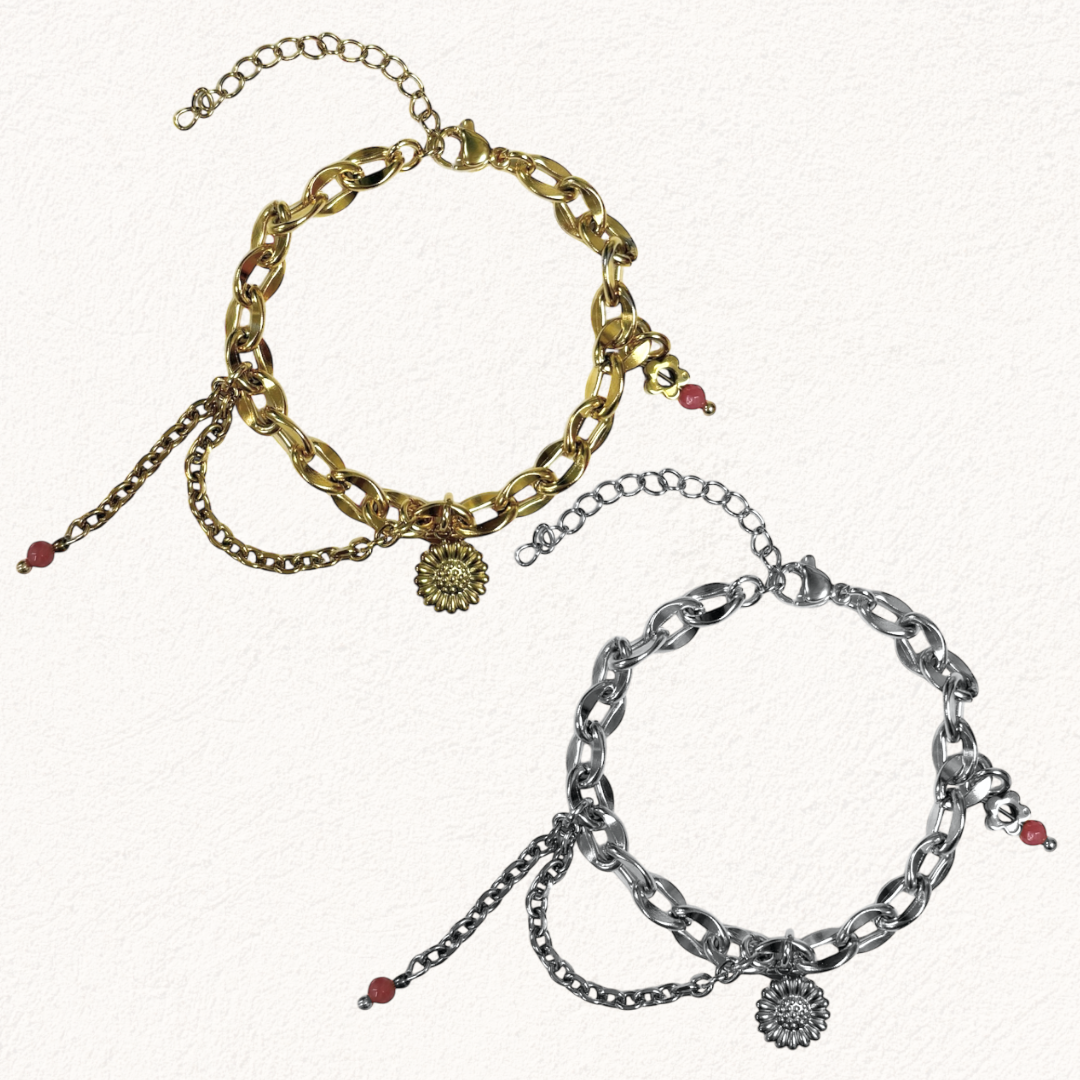 armband met bloem, ketting en roze steentjes