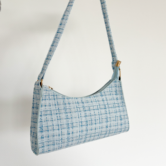 blauw geruite schouder tas